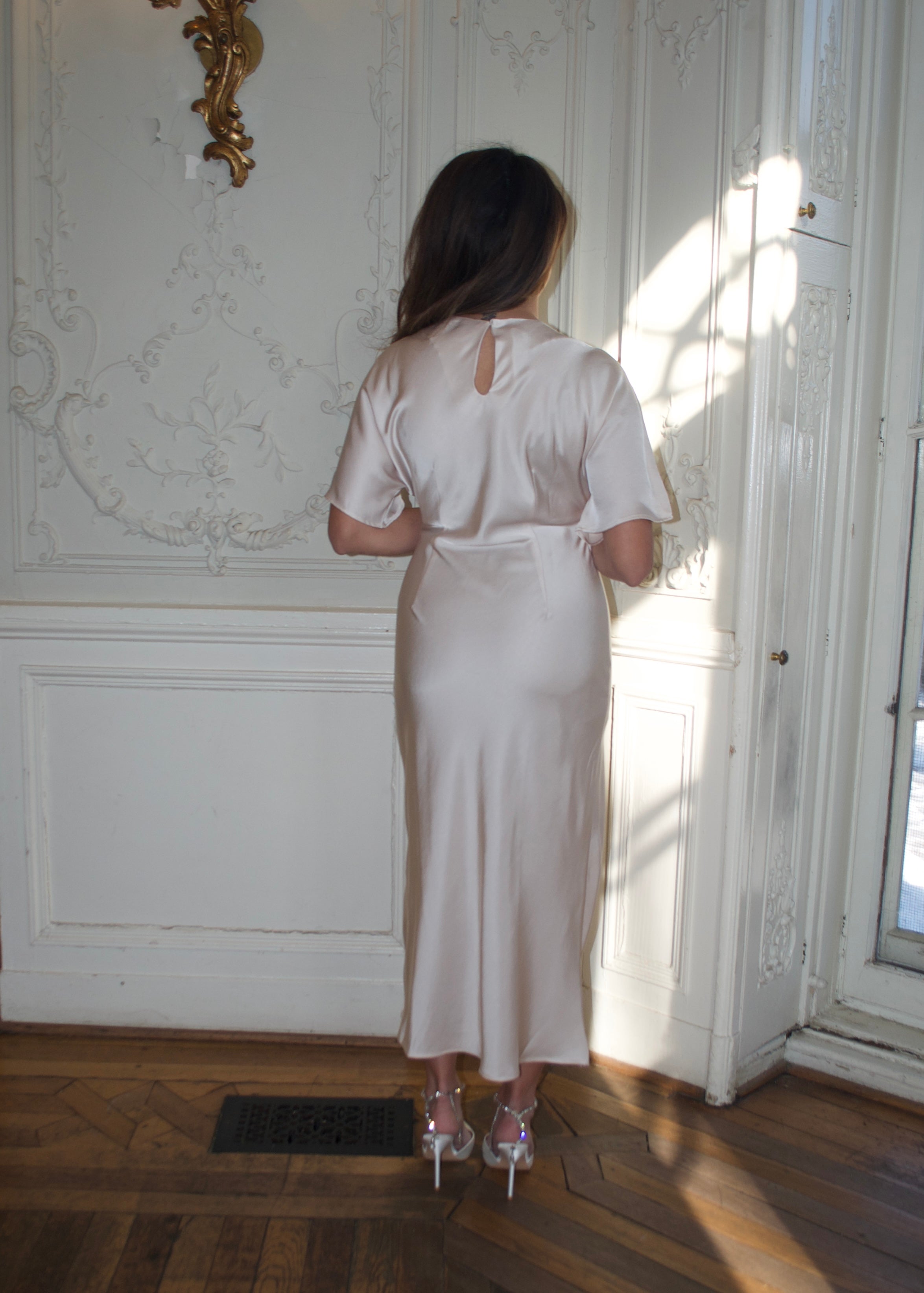 cream colored short sleeve maxi satin dress 