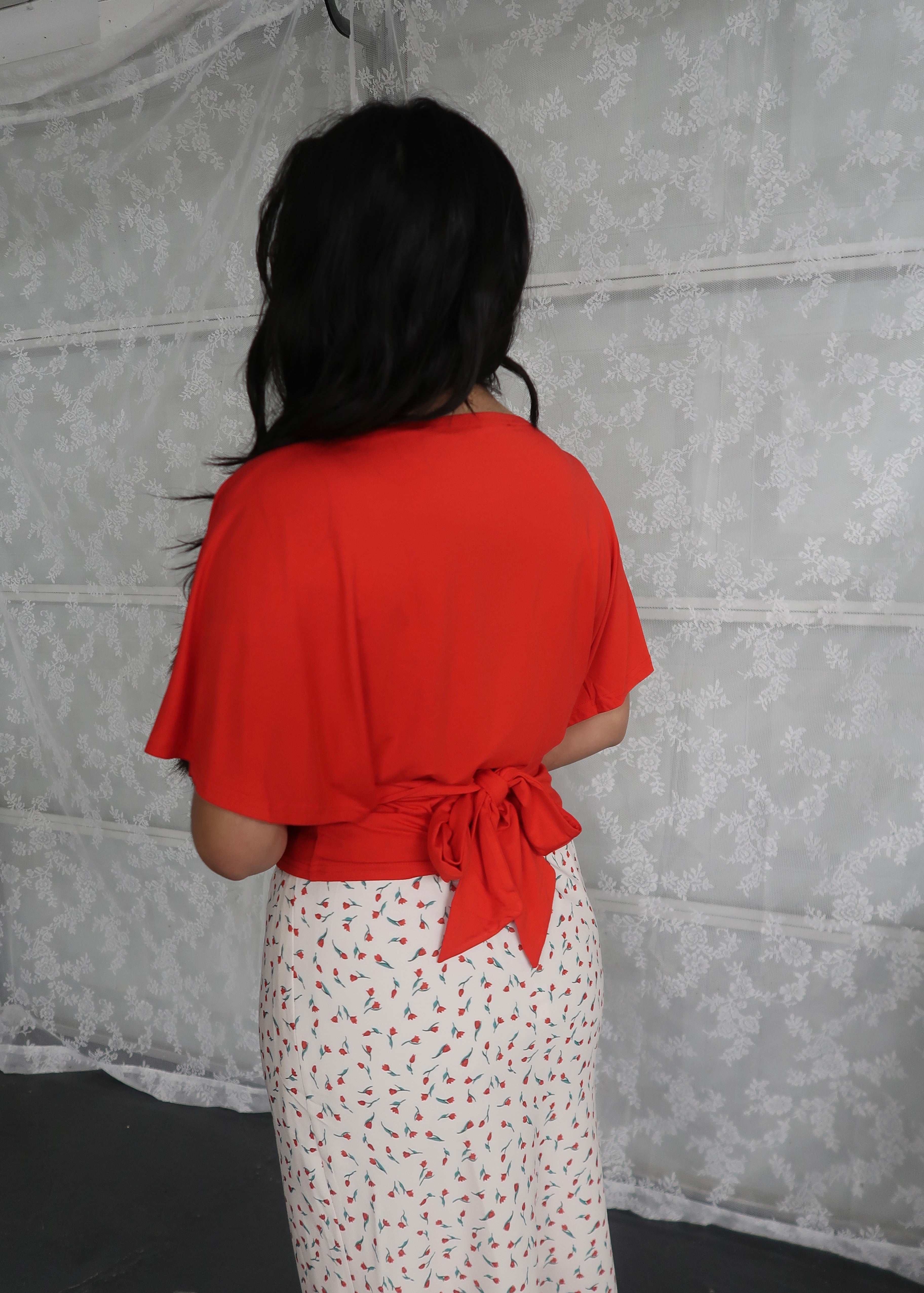 Red short sleeve drape top, back tie, bow
