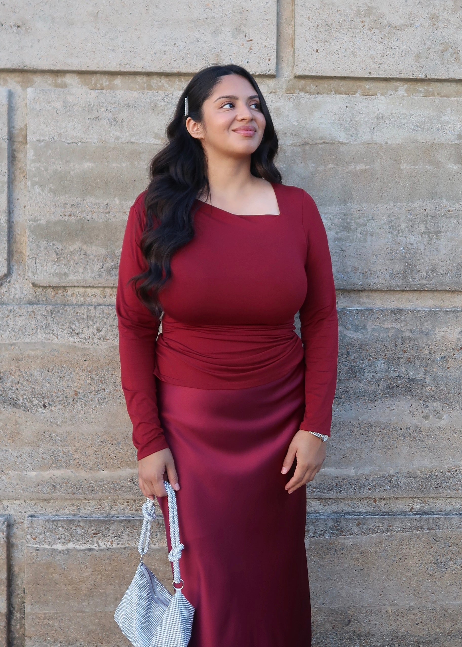 Burgundy long sleeve cut out asymmetrical top