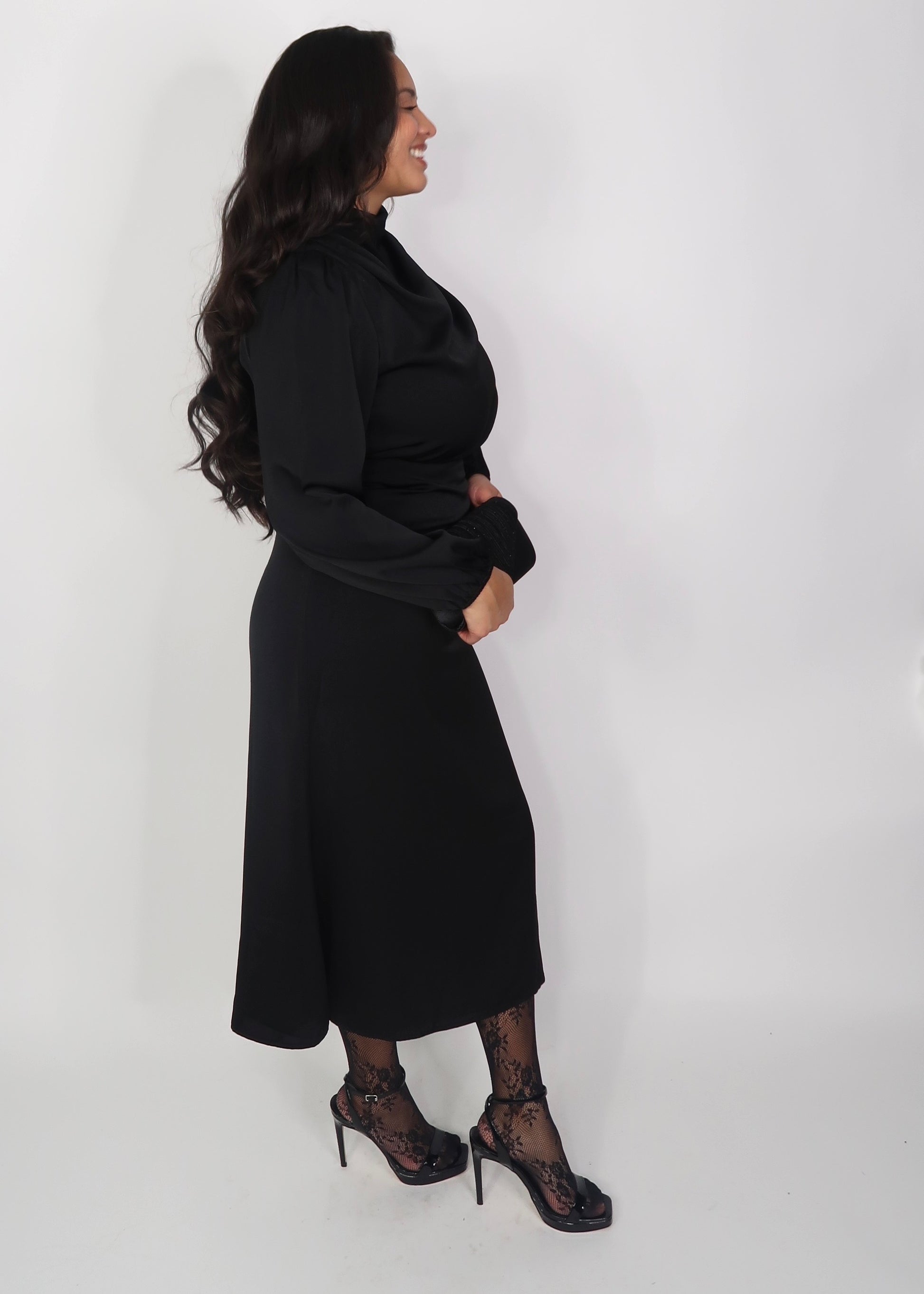 black satin mock neck long sleeve midi dress