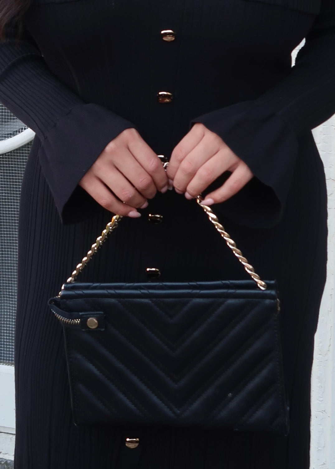 Black sweater dress, gold buttons, cuff sleeves, midi length, v-neck, collar