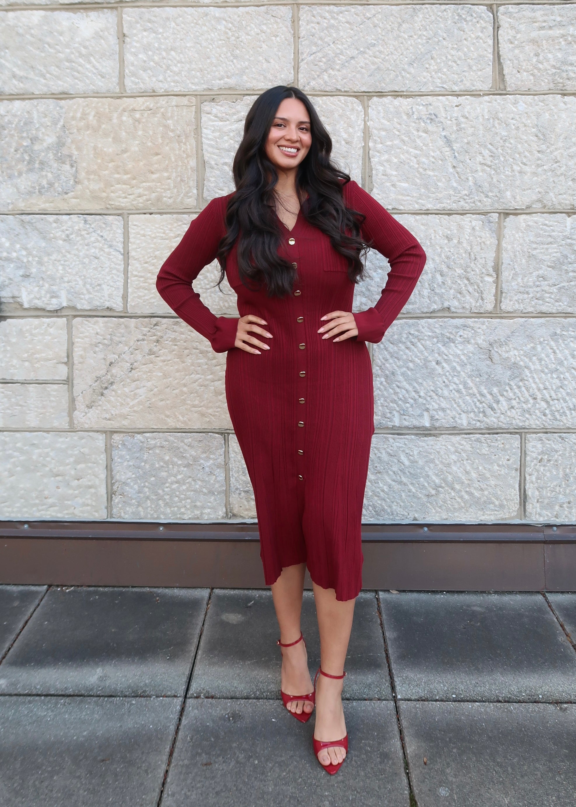 Wine red sweater dress, v-neck, collared, cuff, midi length, gold buttons, red heels