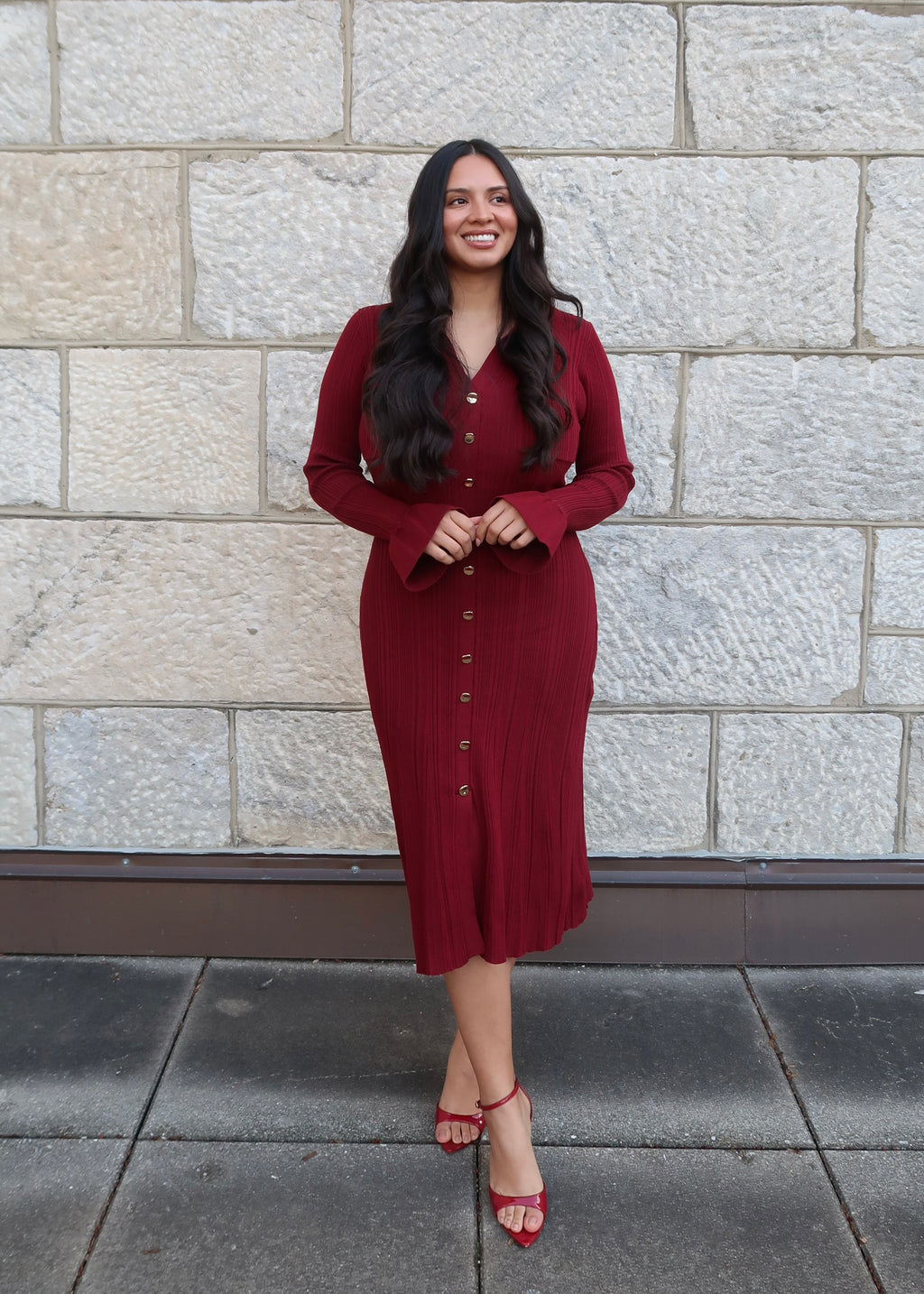 Wine red sweater dress, v-neck, collared, cuff, midi length, gold buttons, red heels