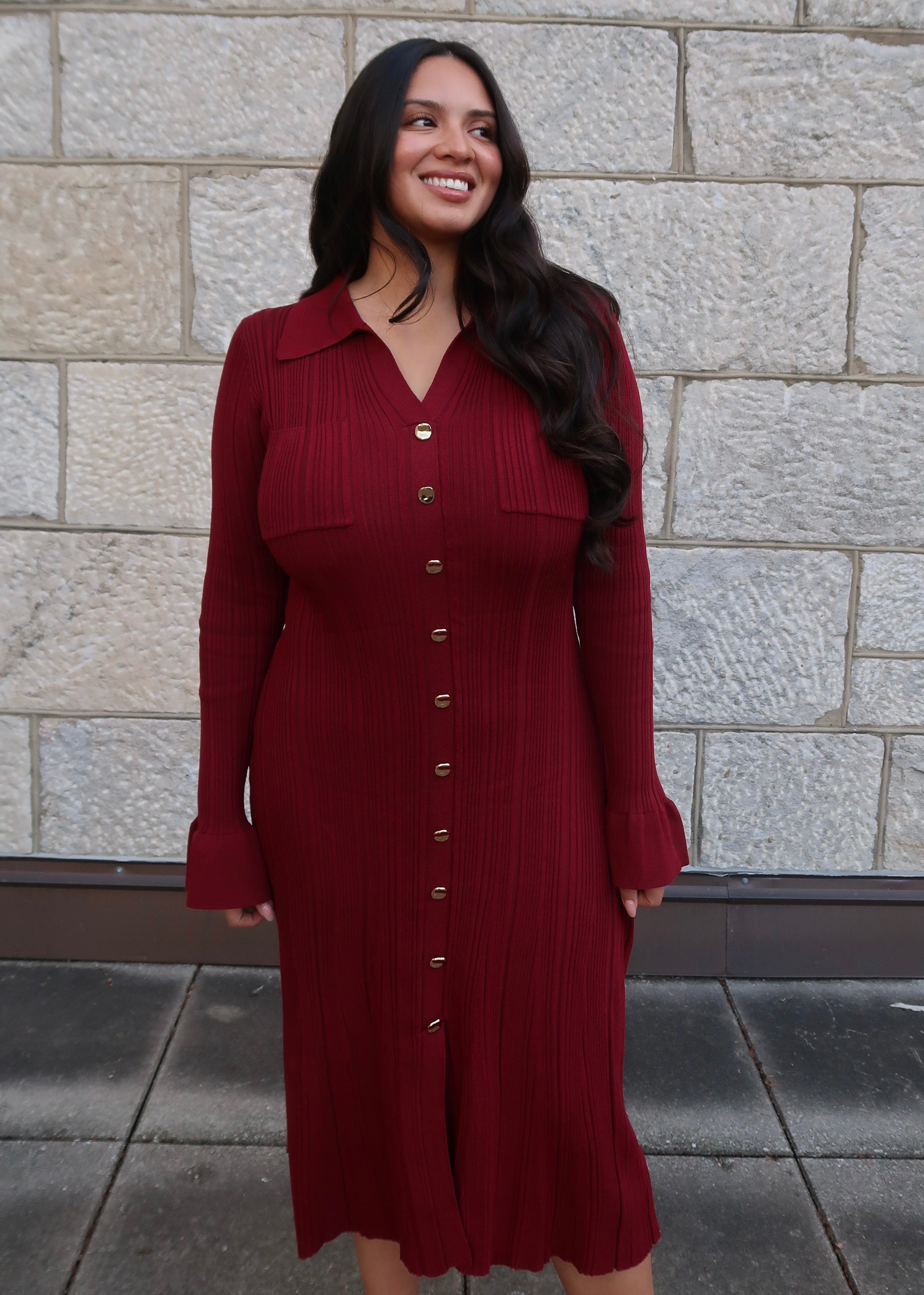 Wine red sweater dress, v-neck, collared, cuff, midi length, gold buttons, red heels