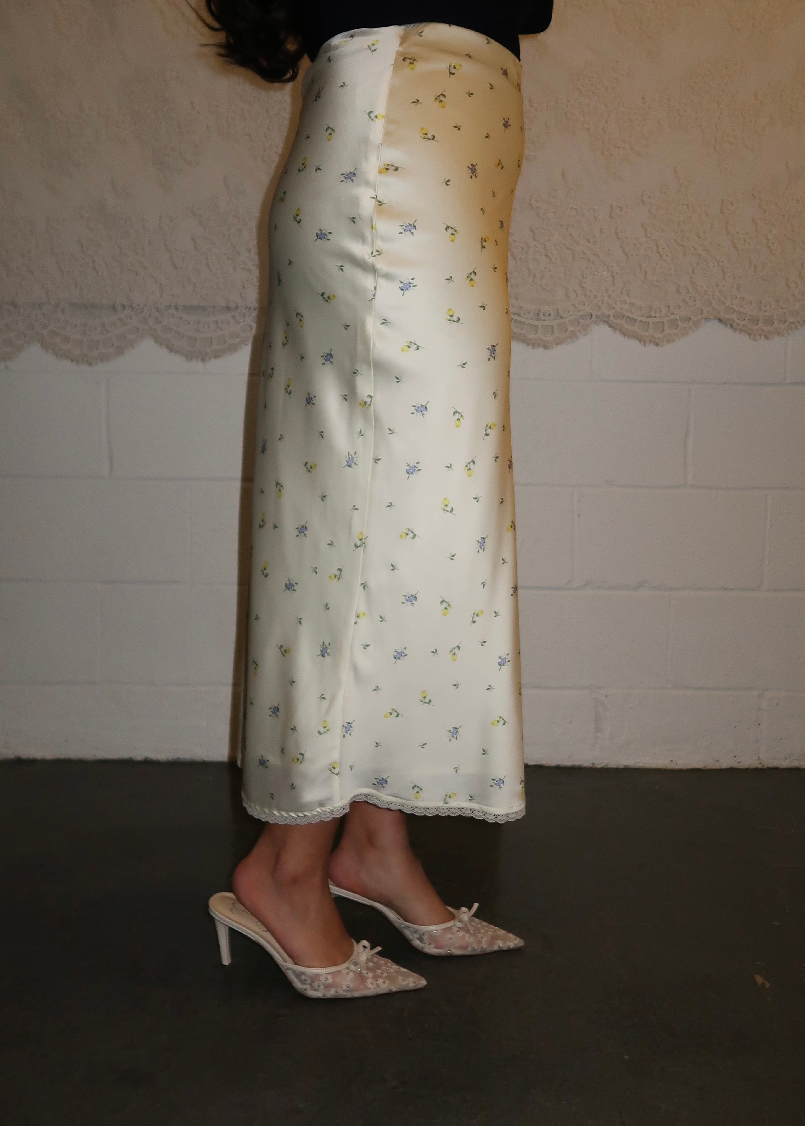 daisy satin midi skirt, lace trim, floral details, butter yellow, cream, satin